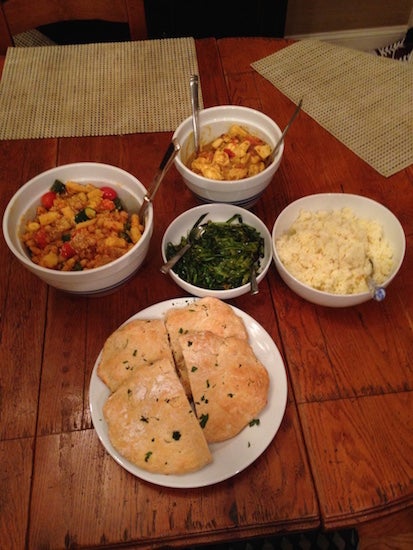 A meal of bread and various sides 