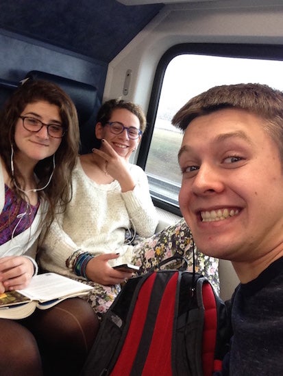 The photographer takes a selfie in a train 