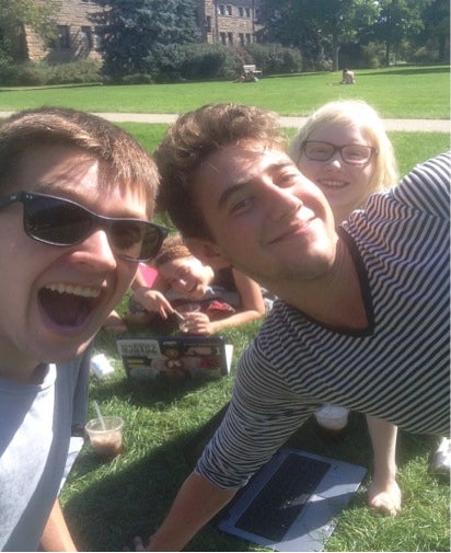 A group of students pose for a selfie in Wilder bowl