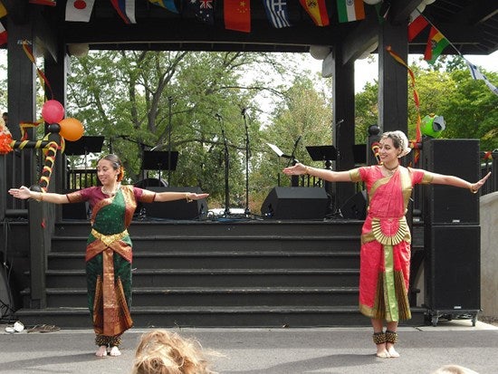 Two dancers in costume at the Clark Bandstand