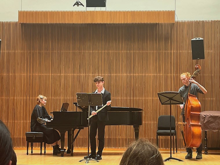 Sofía, myself, and Harry performing on stage in Kulas Recital Hall.