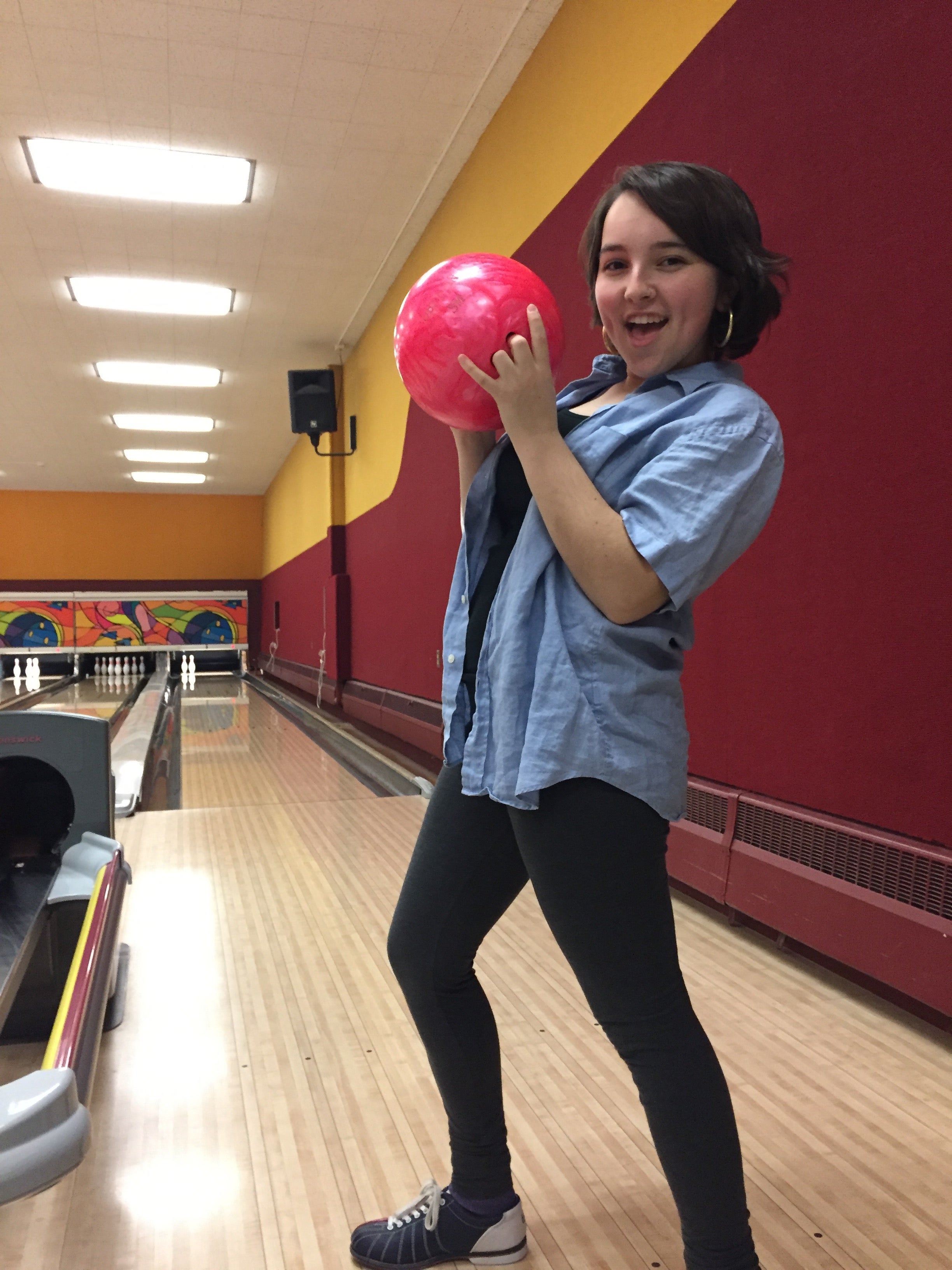 Kira holding a bowling ball