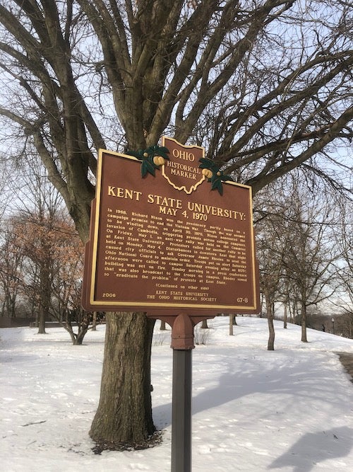 A photo of the Ohio historical marker for Kent State.