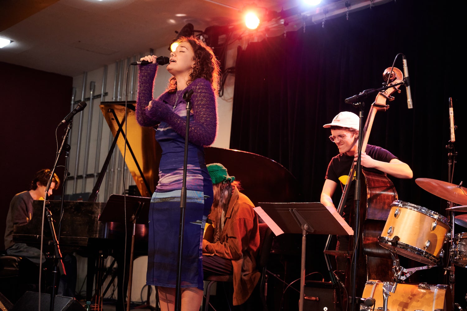 jazz quintet with lead singer performing