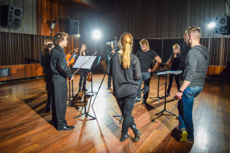 Musicians in a recording studio.