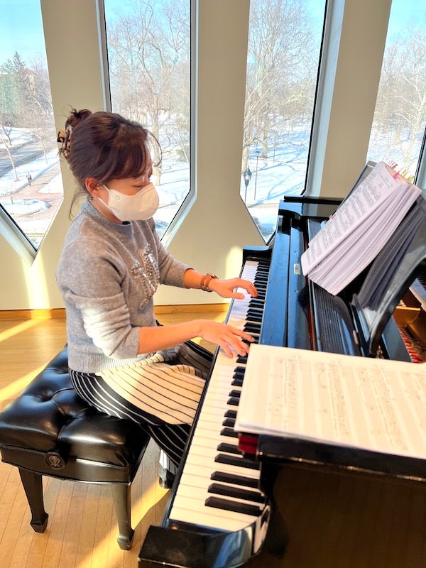 Kyung-Eun Na at the keyboard in Stull Hall.