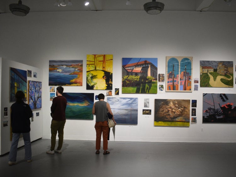 People viewing student art work at last year's exhibition