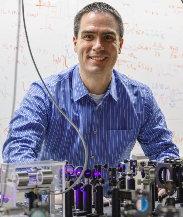 Headshot photograph of Aaron Reinhard