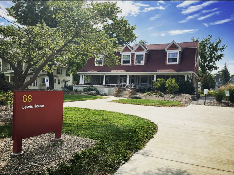 Lewis House building with sign out front