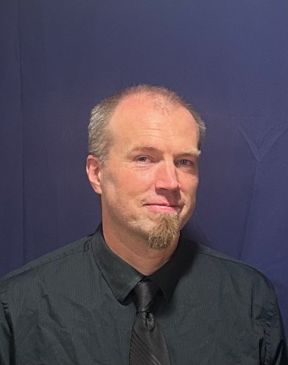 Headshot photograph of Rob Slack