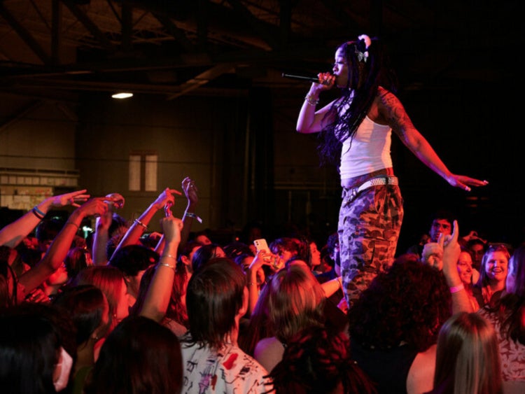 Performer on stage at a previous Solarity event