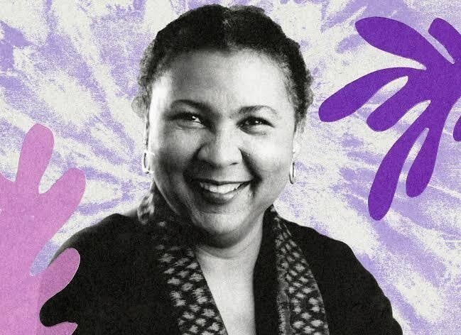 bell hooks photograph with purple background