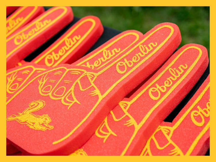 Oberlin athletics branded foam fingers