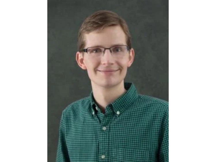 Headshot photograph of William Parsons