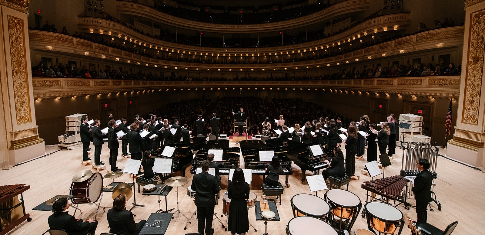 Oberlin College Choir and instrumental ensemble in performance at Carnegie Hall in New York City.