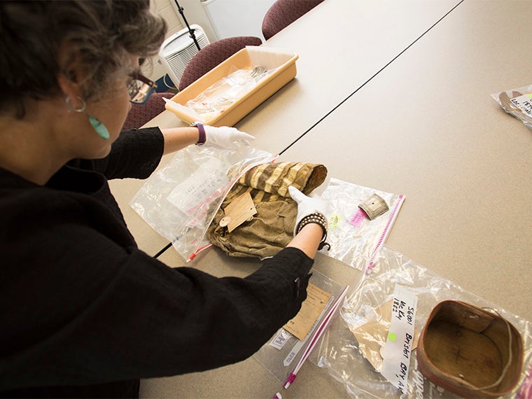 Amy Margaris shows a fish skin bag.