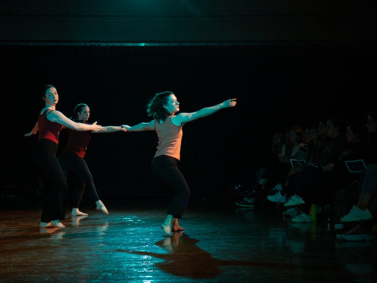 Students dance in a fall performance.