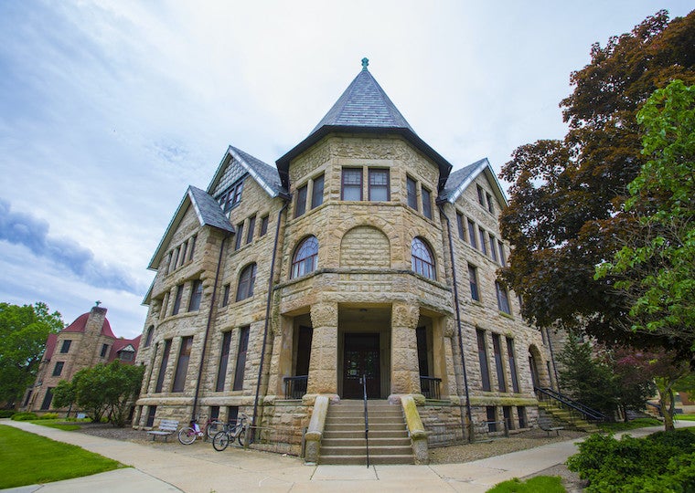 A brick building with brick porch.