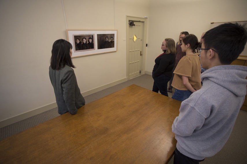 Students make observations about the work "There Sisters" by artist Hǎi Bō as part of the program "Culture, Life, and Family Bonding in the Context of Coronavirus" at the Allen Memorial Art Museum.  