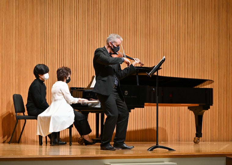 Faculty give a violin recital.