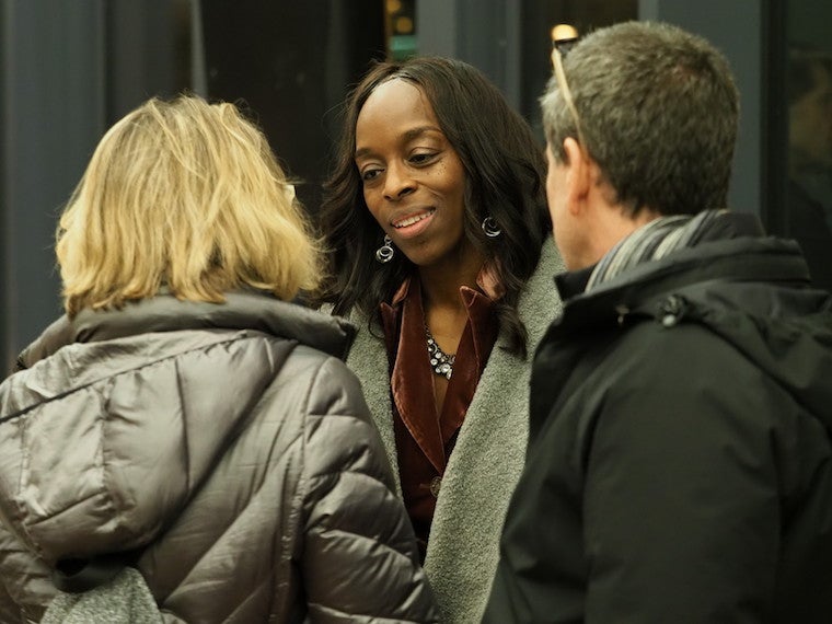 President Amber talks with parents at a reception.