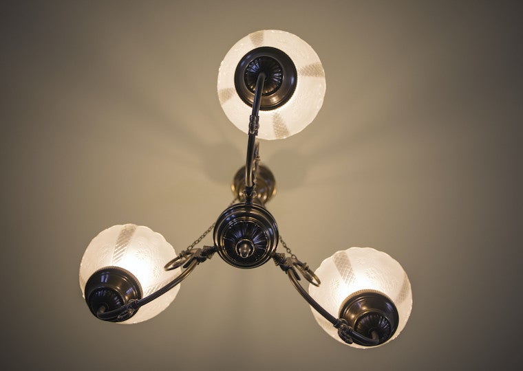 A three glass chandelier