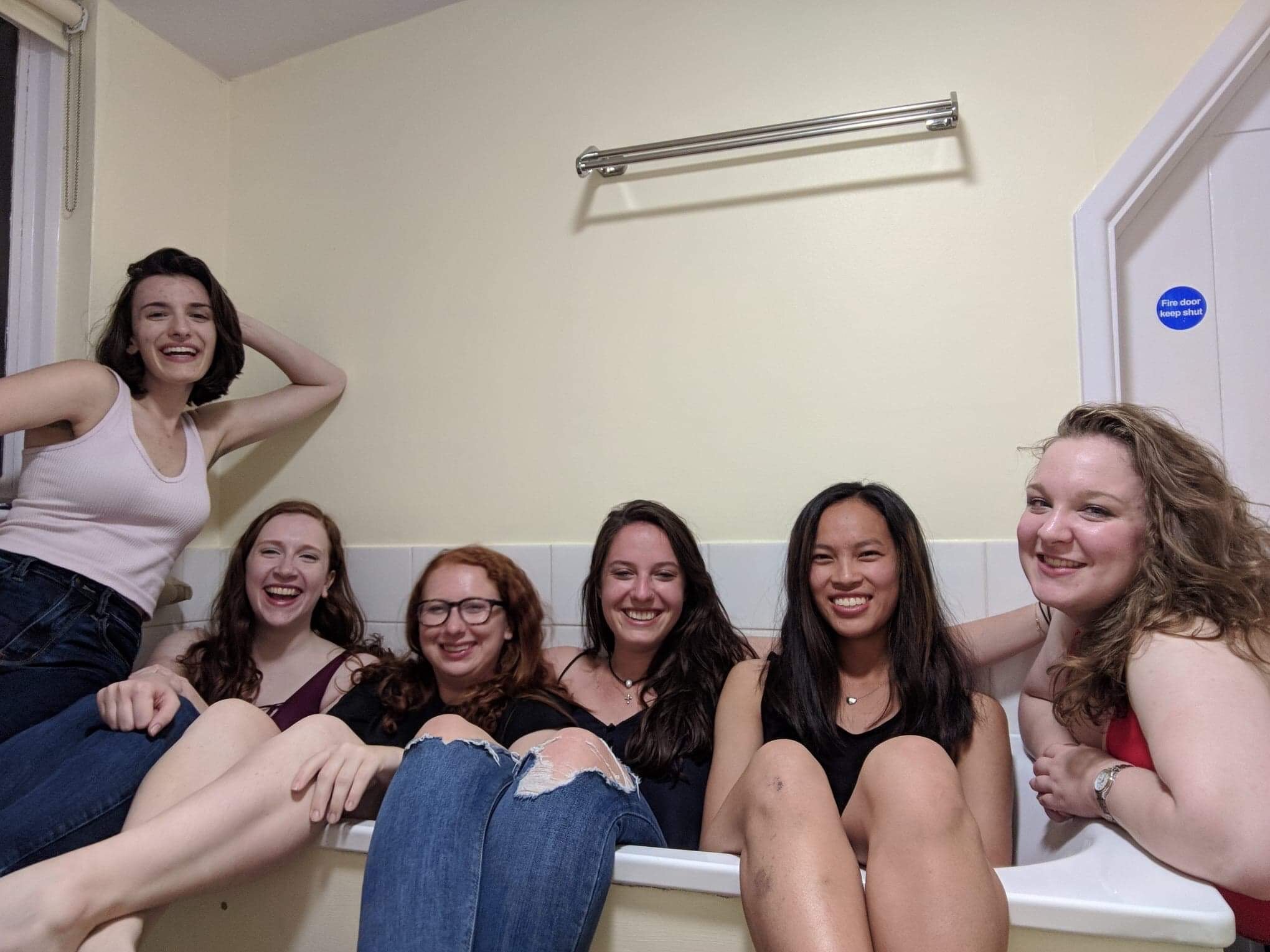 Six girls in a bathtub. (All clothed with no water!)