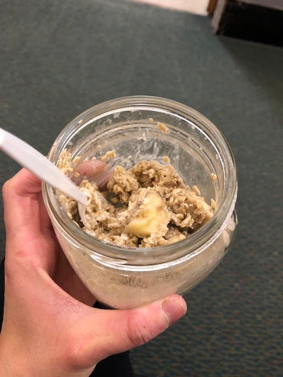 Overnight oats and bananas in a cup.