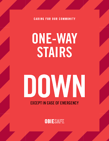 One-way stairs. Down. Except in case of emergency.