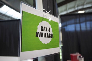 Sign indicates "bay number 4 available"