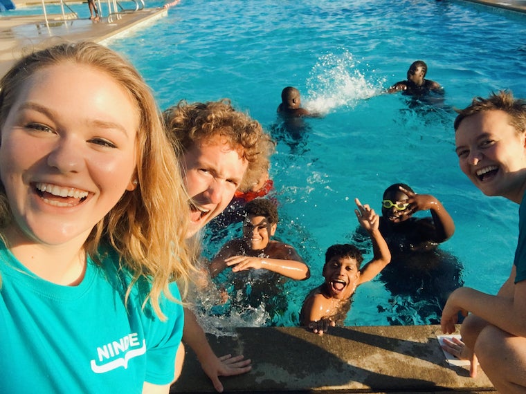 People having fun at the pool. 