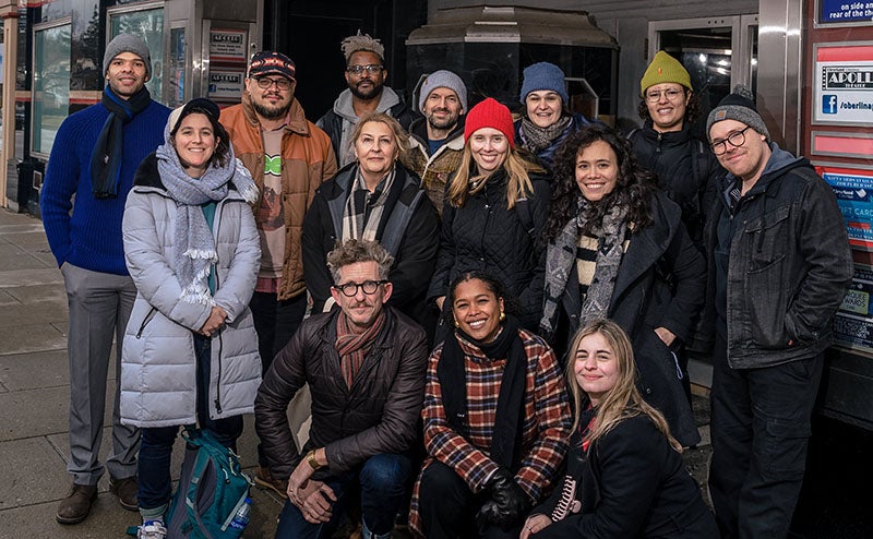 OSI mentors and fellows, pictured outside Oberlin’s historic Apollo Theatre in January 2023.