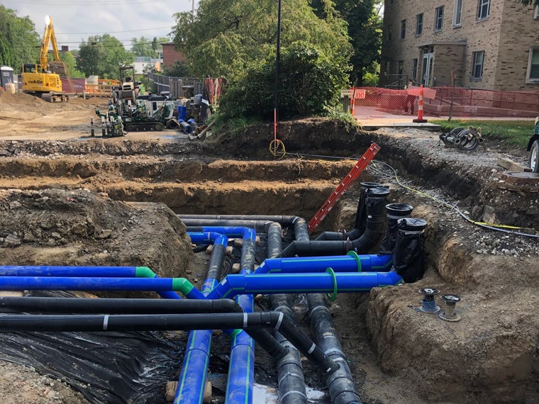 exposed underground pipes in a construction site at Oberlin