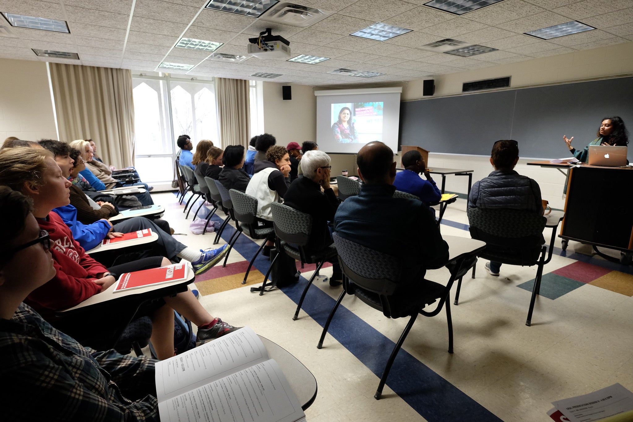 Students listening to a research presentation during Senior Symposium 2019