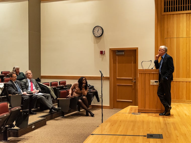 A man talks to an audience.