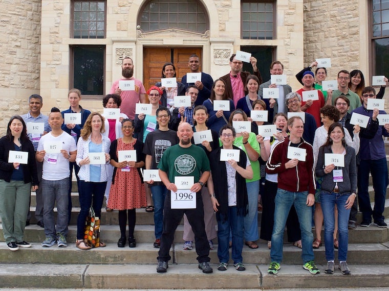 Photo of Class of 1996 with cards at CRW 2017