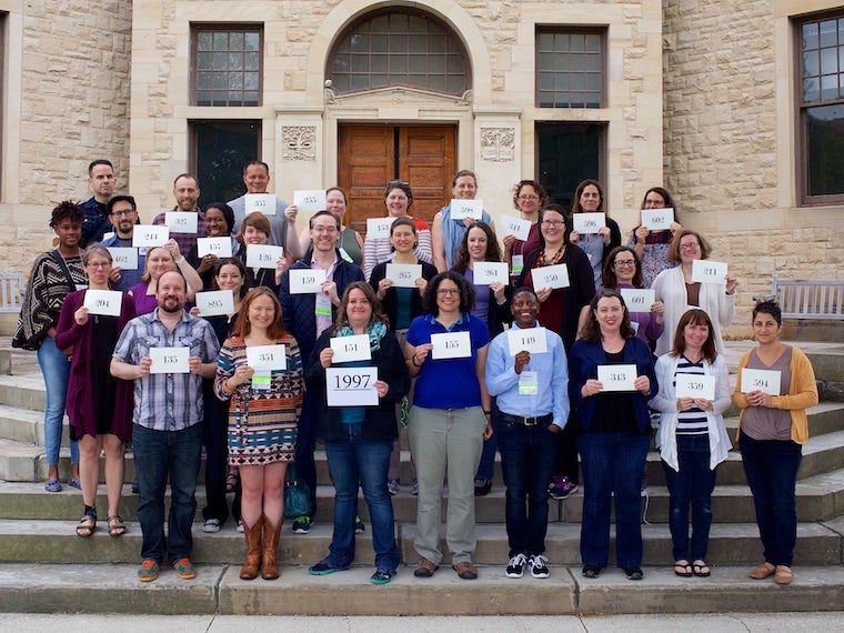 Photo of Class of 1997 with cards at CRW 2017