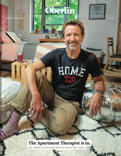A magazine with a man sitting in a dorm room on the cover.