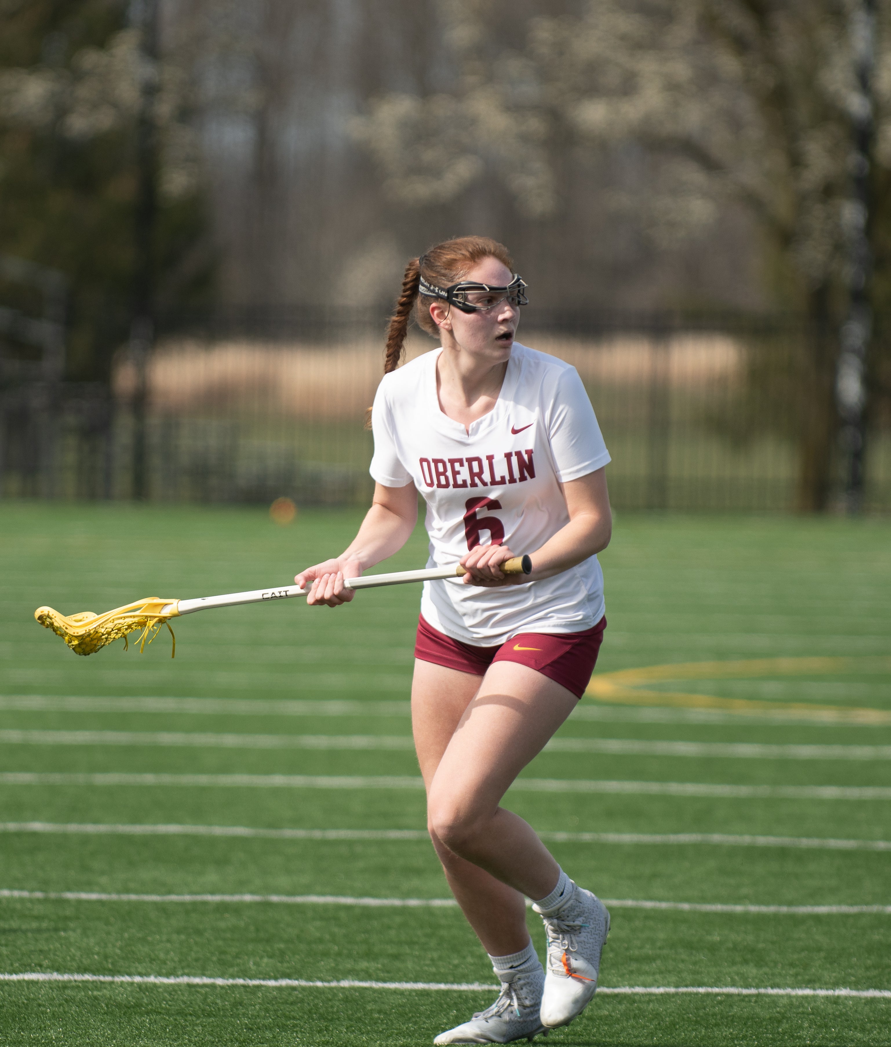 Ellie Jensen playing lacrosse