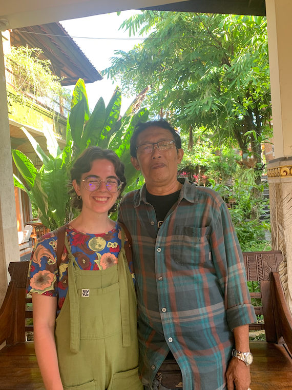 Ilana and an old man smile for the camera 