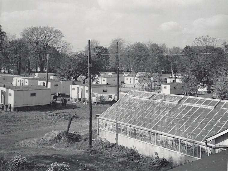 black and white photo of  trailers on Lorain and Woodland streets.