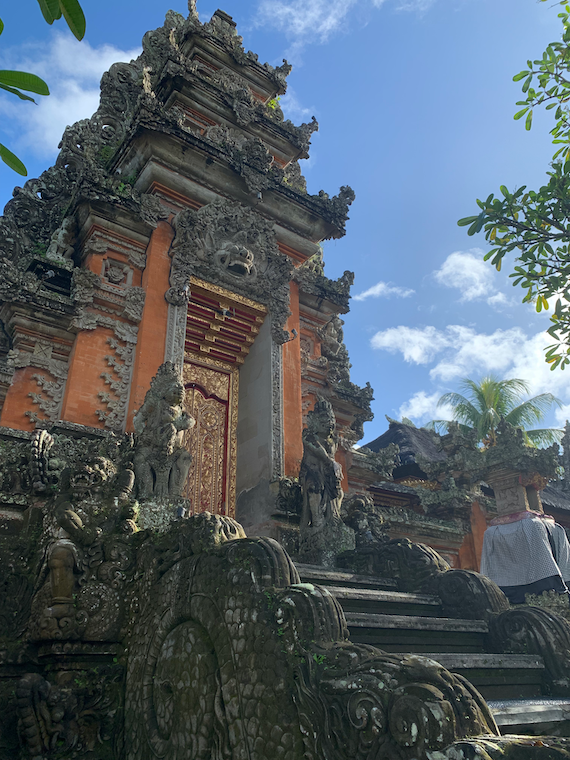 a very intricate orange and grey temple building