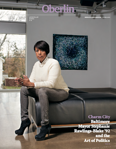 A magazine cover with a woman sitting on a bench in a museum.