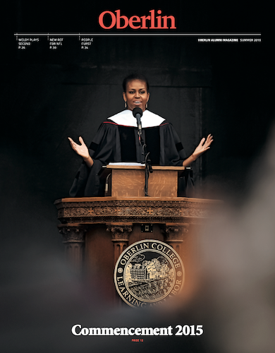 A magazine with Michelle Obama on the cover giving a graduation speech.