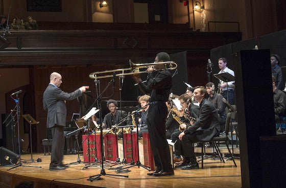 photo of man conducting jazz group