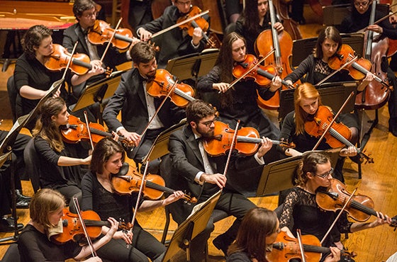 Oberlin Orchestra performs on stage.