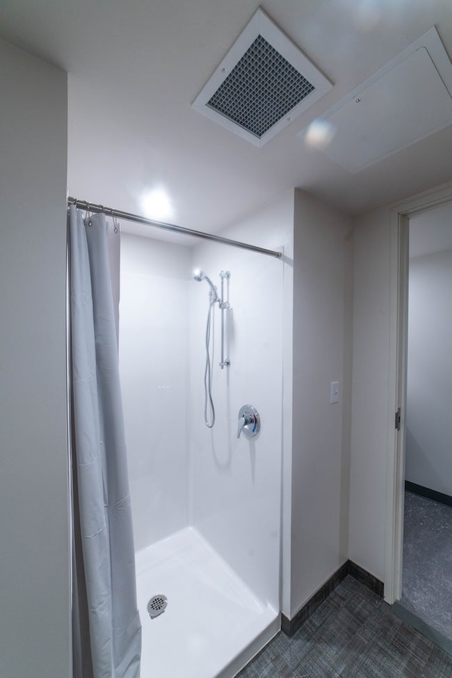 Photo of shower stall with curtain