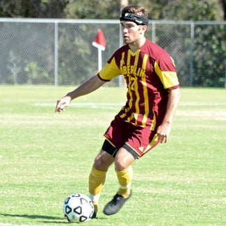 An Oberlin soccer player in action
