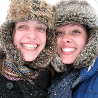 Two friends in Russian-style fur hats