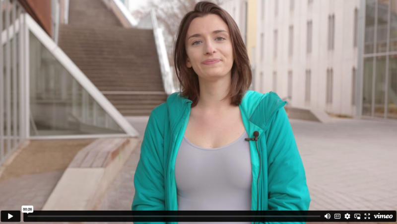 Screenshot of video featuring a smiling student